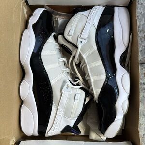 Jordan Men’s Retro Low Top Sneakers in White and Black